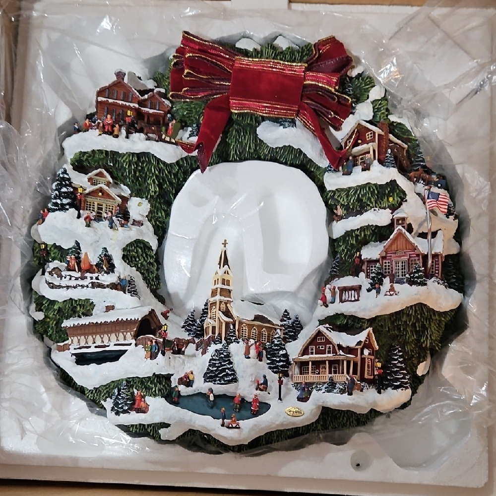 Charming Holiday Village Wreath with Red Bow